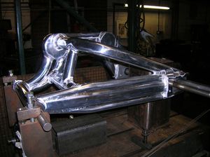ride magazine swinging arm