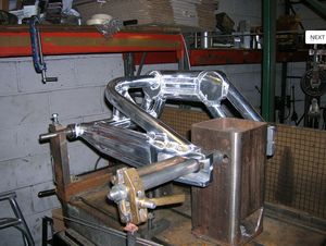 ride magazine swinging arm